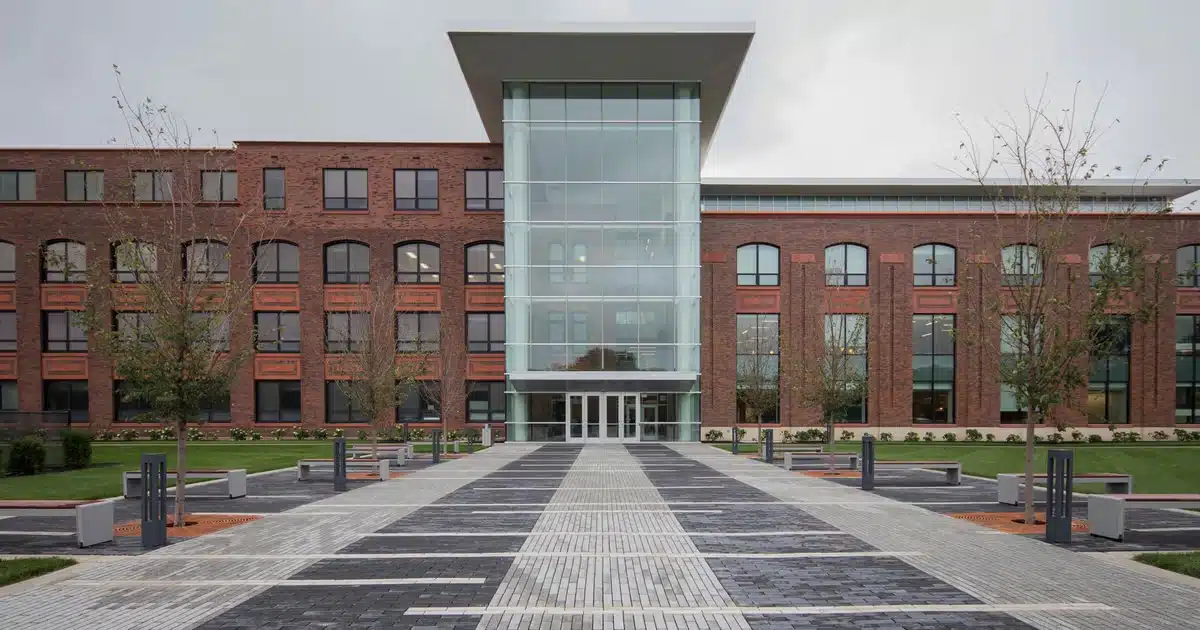 New Trier High School Wilmette IL | MacLagan Home Loans Front exterior entrance of New Trier High School in Wilmette IL one of the top ranked public high schools in the United States